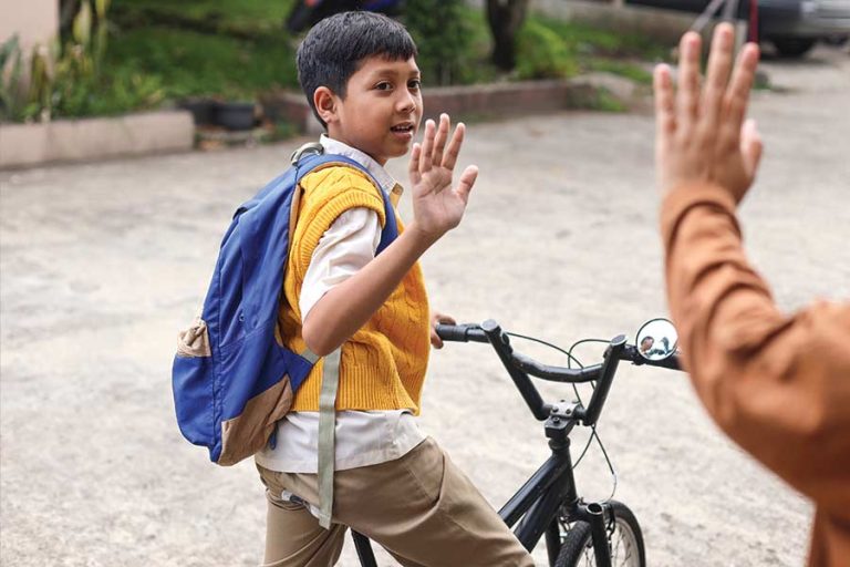 schoolboy-ready-to-ride-bicycle